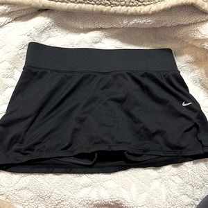 A black tennis/golf skirt Nike size Small